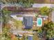Bird's-eye view of a home with a pool in the backyard at 11650 County Road 579 Hwy, Thonotosassa, FL 33592