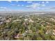 Aerial view showing home, neighborhood, and distant highway at 11650 County Road 579 Hwy, Thonotosassa, FL 33592