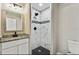 Clean bathroom with granite vanity and tiled shower at 11650 County Road 579 Hwy, Thonotosassa, FL 33592