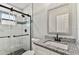 Modern bathroom with granite countertop and walk-in shower at 11650 County Road 579 Hwy, Thonotosassa, FL 33592