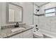 Updated bathroom with granite vanity and tiled shower/tub at 11650 County Road 579 Hwy, Thonotosassa, FL 33592