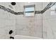 Clean bathroom with tiled shower and bathtub at 11650 County Road 579 Hwy, Thonotosassa, FL 33592