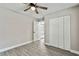 Bright bedroom with ceiling fan and ample closet space at 11650 County Road 579 Hwy, Thonotosassa, FL 33592