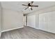 Bright bedroom with wood-look floors and ample closet space at 11650 County Road 579 Hwy, Thonotosassa, FL 33592