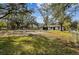 Charming house with a large grassy yard, surrounded by mature trees at 11650 County Road 579 Hwy, Thonotosassa, FL 33592