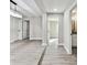 Bright hallway with access to several rooms and bath at 11650 County Road 579 Hwy, Thonotosassa, FL 33592