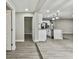 Long hallway with view into kitchen and other rooms at 11650 County Road 579 Hwy, Thonotosassa, FL 33592