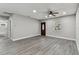 Bright and airy living room with neutral walls and vinyl plank flooring at 11650 County Road 579 Hwy, Thonotosassa, FL 33592
