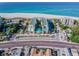 Aerial image showcasing beachfront property, highlighting its location and amenities at 12000 Gulf Blvd # 309N, Treasure Island, FL 33706