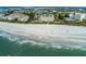 Aerial perspective showcasing the condo's prime beachfront location at 12000 Gulf Blvd # 309N, Treasure Island, FL 33706