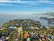 Aerial view of waterfront homes with city skyline in background at 1388 Brightwaters Ne Blvd, St Petersburg, FL 33704