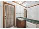 Cozy bathroom featuring a wood vanity, and accent lighting at 1388 Brightwaters Ne Blvd, St Petersburg, FL 33704