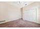 This bedroom features a double door closet and neutral paint at 1388 Brightwaters Ne Blvd, St Petersburg, FL 33704