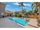 Spacious rectangular pool with a spa and a large patio area at 1388 Brightwaters Ne Blvd, St Petersburg, FL 33704