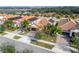 Community overview featuring several homes with solar panels at 16820 Anchor Root St, Wimauma, FL 33598