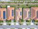 Bird's eye view of homes showcasing solar panel installations at 16820 Anchor Root St, Wimauma, FL 33598