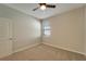 Bright bedroom with ceiling fan and neutral decor at 16820 Anchor Root St, Wimauma, FL 33598