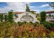 Medley Clubhouse sign entrance with landscaping at 16820 Anchor Root St, Wimauma, FL 33598