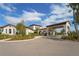 Medley community clubhouse entrance with covered drive at 16820 Anchor Root St, Wimauma, FL 33598