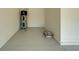 Garage interior with water heater and extra space at 16820 Anchor Root St, Wimauma, FL 33598