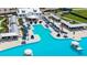 Luxury pool area with cabanas and lounge chairs at 16820 Anchor Root St, Wimauma, FL 33598
