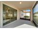 Spacious screened patio with sliding glass doors at 16820 Anchor Root St, Wimauma, FL 33598