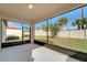 Bright and airy screened patio overlooking the backyard at 16820 Anchor Root St, Wimauma, FL 33598
