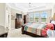Spacious main bedroom with large bed and ample storage at 21680 Violet Periwinkle Dr, Land O Lakes, FL 34637