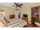 Comfortable bedroom with a dresser and flat-screen TV at 2750 E Bay Dr # 15E, Largo, FL 33771