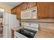 Bright kitchen features updated appliances and cabinetry at 2750 E Bay Dr # 15E, Largo, FL 33771