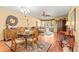Spacious living room with hardwood floors and access to balcony at 2750 E Bay Dr # 15E, Largo, FL 33771