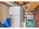 Indoor storage area with shelves and refrigerator at 2750 E Bay Dr # 15E, Largo, FL 33771