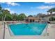 Relaxing community pool with ample seating at 2750 E Bay Dr # 15E, Largo, FL 33771