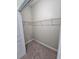 Walk-in closet with wire shelving, providing ample storage space at 295 Woodstream Way, Spring Hill, FL 34608