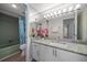 Updated bathroom with granite vanity and shower/tub combo at 3100 Gulf Blvd # 424, Belleair Beach, FL 33786