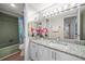 Updated bathroom with granite vanity and shower/tub combo at 3100 Gulf Blvd # 424, Belleair Beach, FL 33786