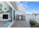 Balcony with a seating area and a waterfront view at 322 Windrush Blvd # 2, Indian Rocks Beach, FL 33785