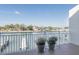 Waterfront balcony view overlooking boat docks and neighborhood homes at 322 Windrush Blvd # 2, Indian Rocks Beach, FL 33785