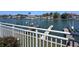 Water view from the balcony overlooking a canal with docks and waterfront homes at 322 Windrush Blvd # 2, Indian Rocks Beach, FL 33785