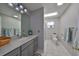Bright bathroom with updated vanity, neutral tones, and a clean, modern design at 407 Blackhawk Cir, Sun City Center, FL 33573