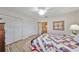 Comfortable bedroom with ample closet space and a calming ambiance for restful nights at 407 Blackhawk Cir, Sun City Center, FL 33573