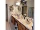 Double vanity bathroom with ample storage at 5125 Silver Charm Ter, Wesley Chapel, FL 33544