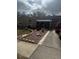 House exterior with landscaped yard and driveway at 515 Cottage Ln, Brandon, FL 33510