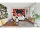 Home office with a modern desk and red accent wall at 5308 Clewis Ave, Tampa, FL 33610