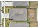 Top-down view of house and backyard with firepit at 5493 Blue Azure Dr, Wimauma, FL 33598