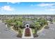 Aerial view of community with pool and clubhouse at 5493 Blue Azure Dr, Wimauma, FL 33598
