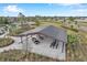 Community picnic pavilion with multiple tables and benches, providing a shaded outdoor space at 5493 Blue Azure Dr, Wimauma, FL 33598
