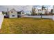 Spacious grassy backyard with a white fence at 5946 Bayou Grande Ne Blvd, St Petersburg, FL 33703