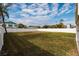 Sprawling backyard with manicured lawn and privacy fence at 5946 Bayou Grande Ne Blvd, St Petersburg, FL 33703