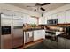 Well-equipped kitchen with stainless steel appliances, white cabinets, and granite countertops at 5946 Bayou Grande Ne Blvd, St Petersburg, FL 33703
